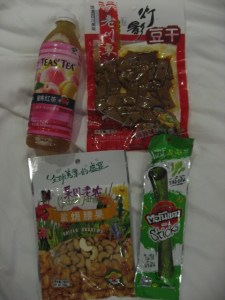 peach tea, veggie jerky "bean beef", cashews, seaweed snack