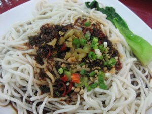 Sichuan noodles. No real sauce, only fried onions, chillies and soy sauce and lots of raw garlic
